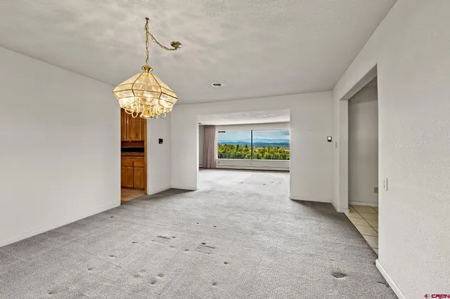 a view of entryway with chandelier