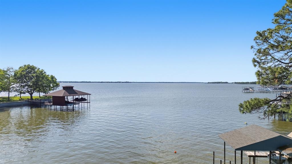 114 Trails End Mabank, TX 75156 - Photo 2 of 40 a view of a lake with outdoor space