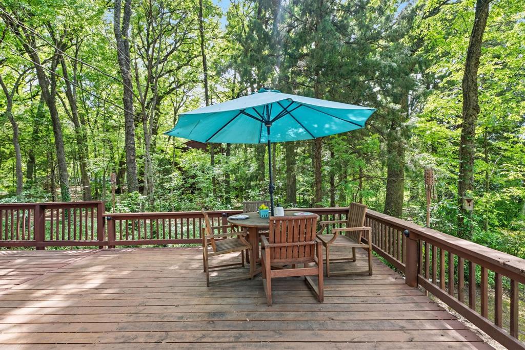 114 Trails End Mabank, TX 75156 - Photo 37 of 40 a view of deck with furniture and barbeque oven