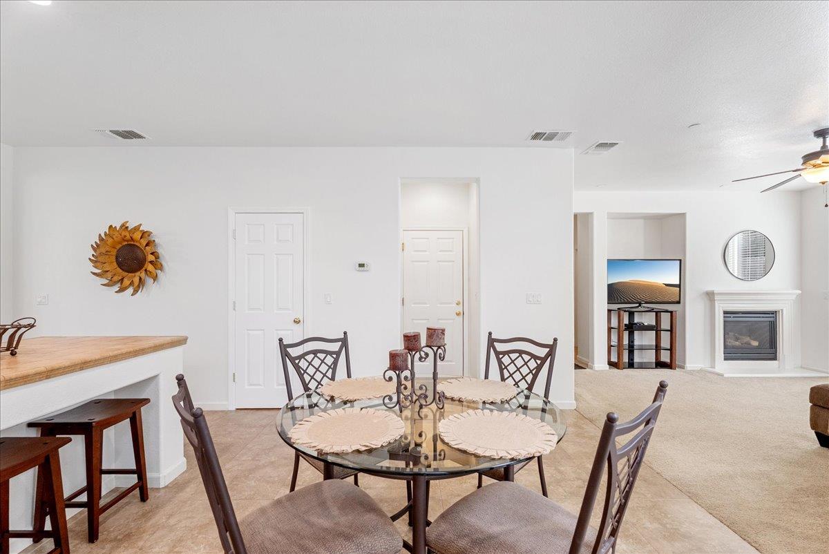 719 Courtyards Loop Lincoln, CA 95648 - Photo 13 of 33 a dining room with furniture and window