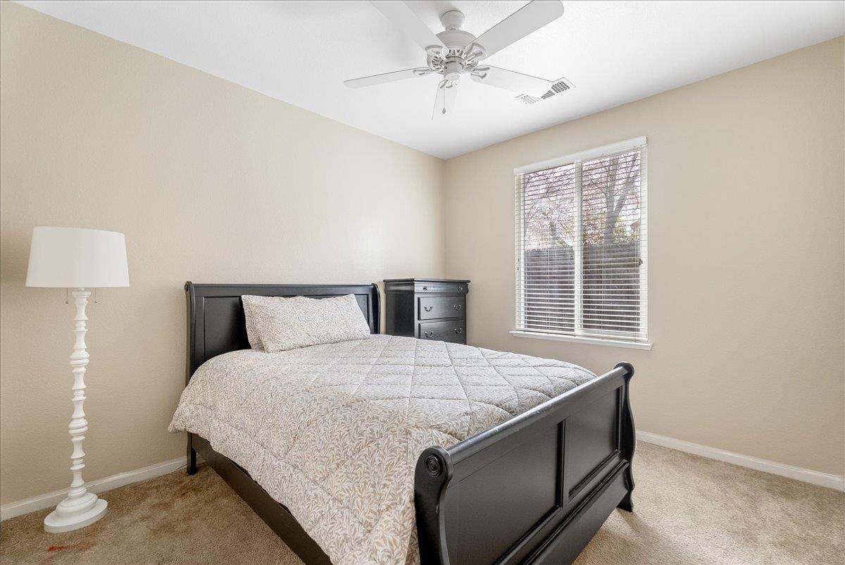 719 Courtyards Loop Lincoln, CA 95648 - Photo 23 of 33 a bedroom with a bed and a window
