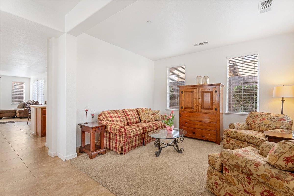 719 Courtyards Loop Lincoln, CA 95648 - Photo 7 of 33 a bedroom with furniture and a window