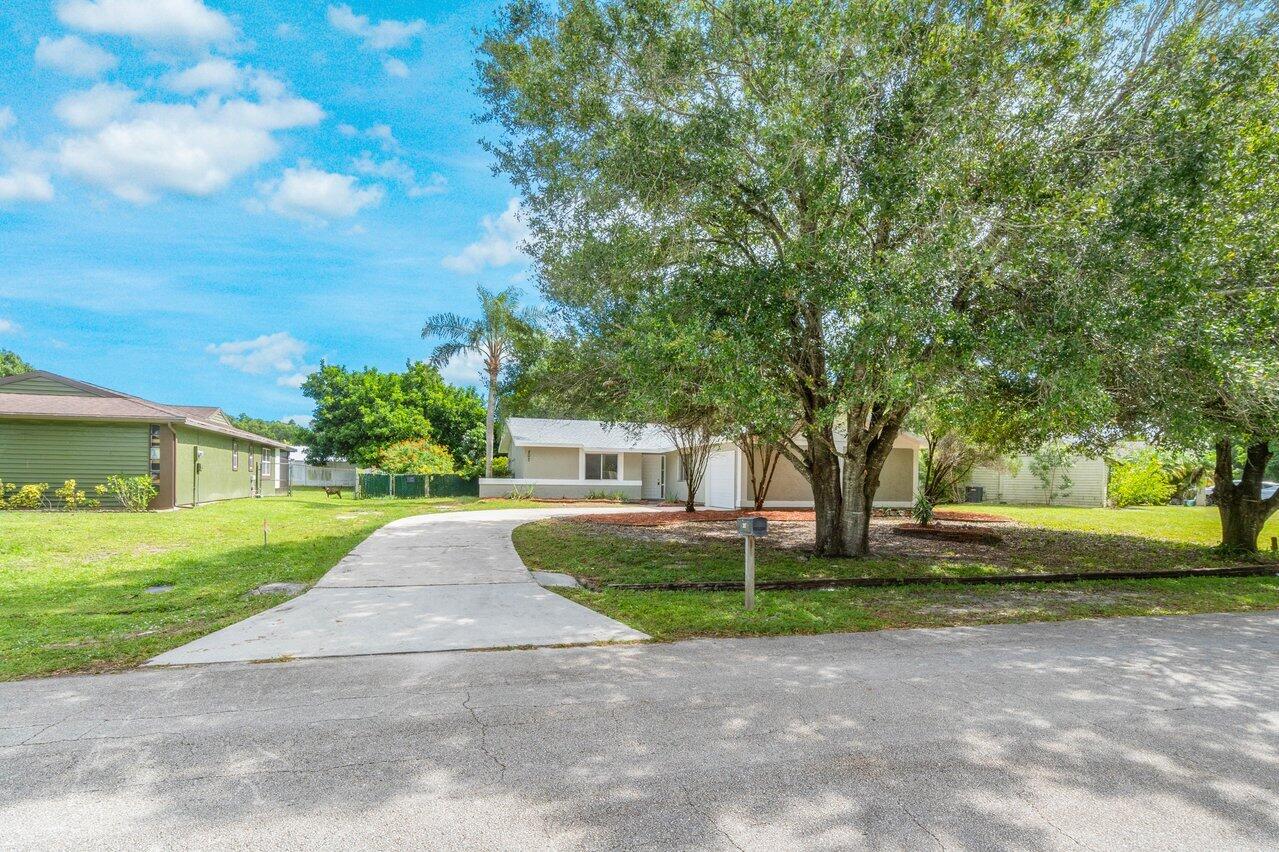207 Southwest Homeland Road Port St. Lucie, FL 34953 - Photo 1 of 30 001-207SouthwestHomelandRoad-PortStLucie