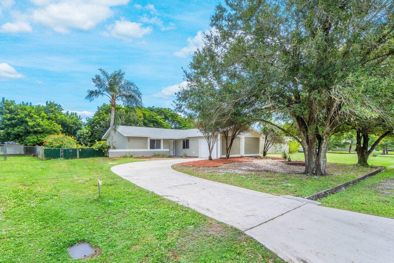 207 Southwest Homeland Road Port St. Lucie, FL 34953 - Photo 3 of 30 004-207SouthwestHomelandRoad-PortStLucie