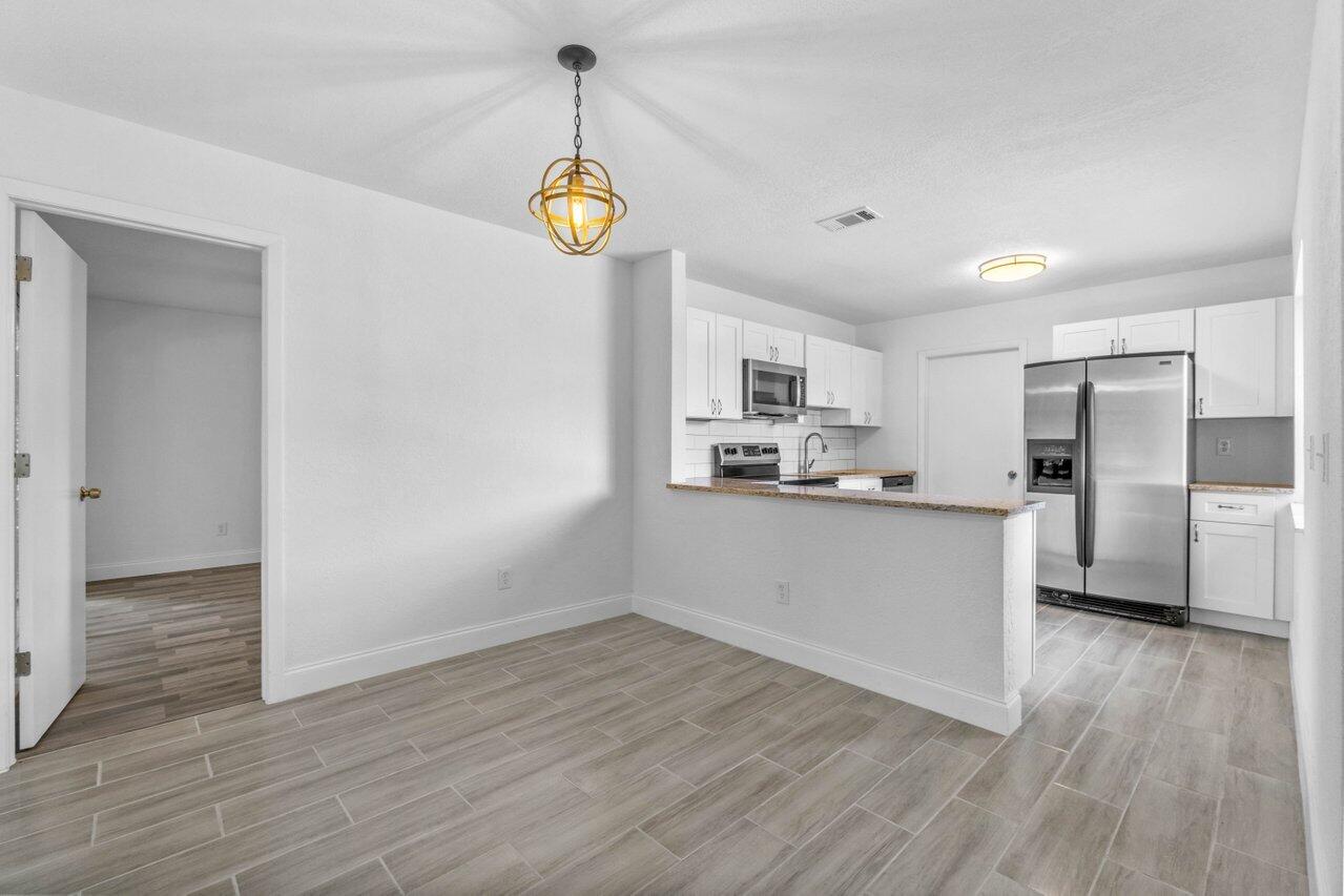 207 Southwest Homeland Road Port St. Lucie, FL 34953 - Photo 6 of 30 007-207SouthwestHomelandRoad-PortStLucie
