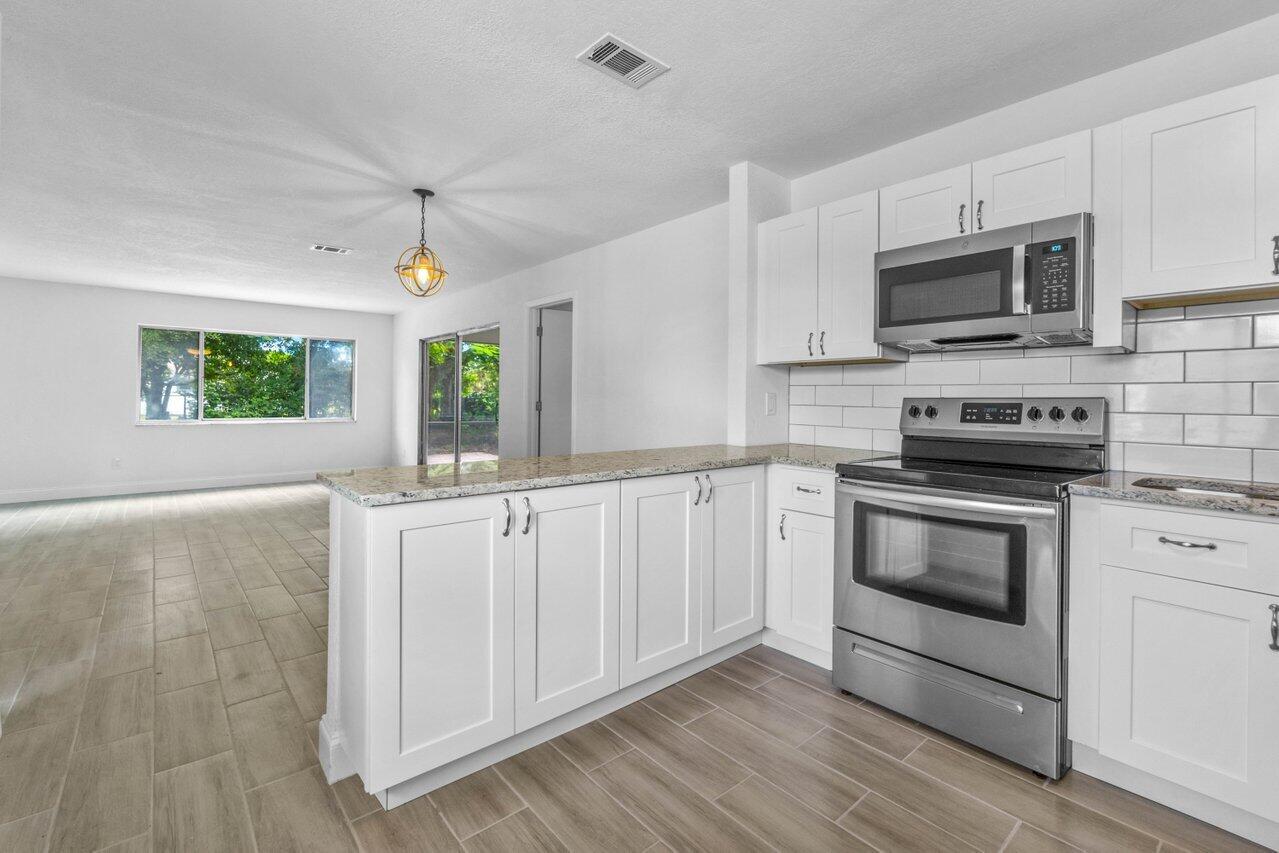 207 Southwest Homeland Road Port St. Lucie, FL 34953 - Photo 8 of 30 009-207SouthwestHomelandRoad-PortStLucie