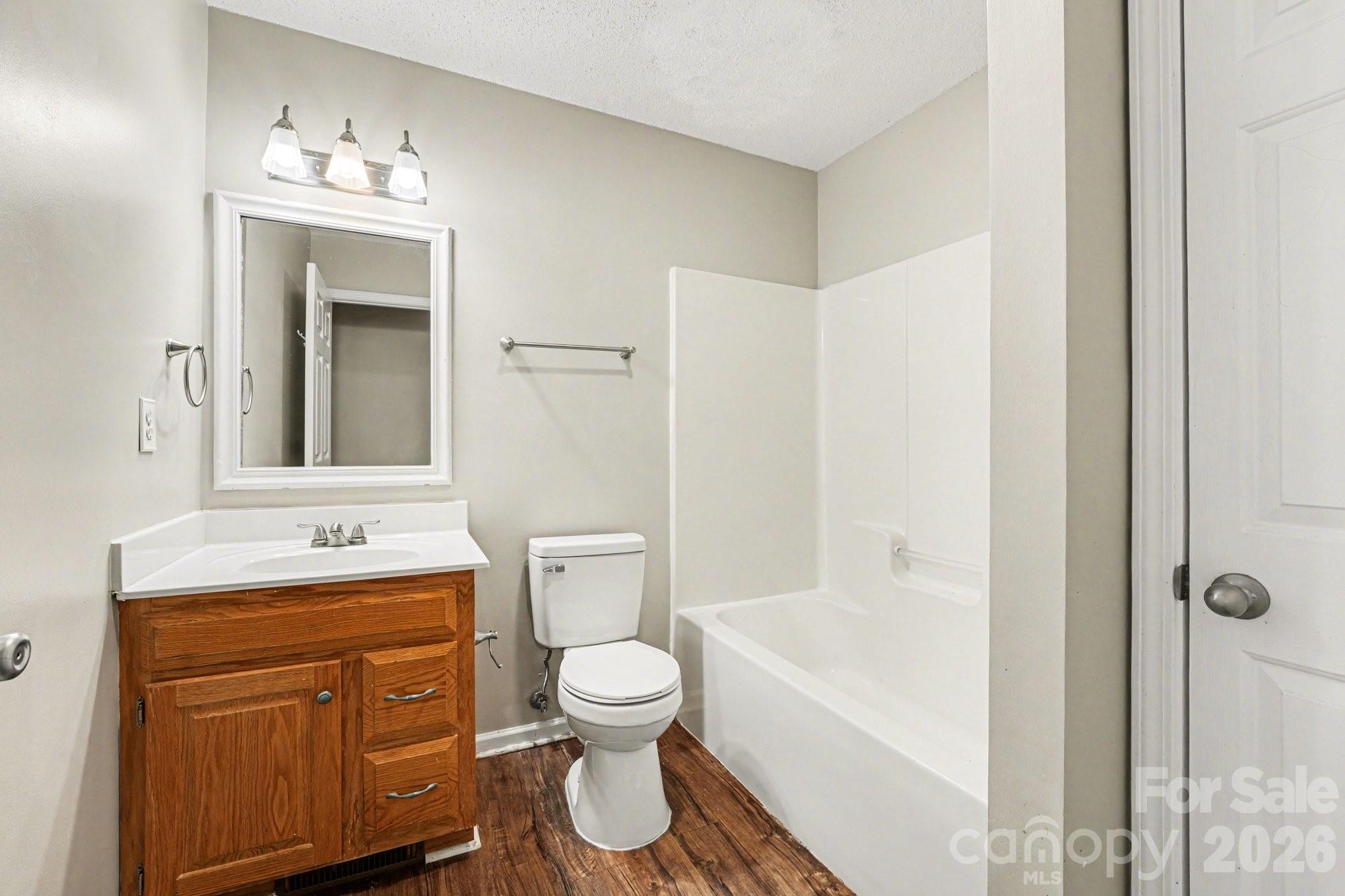 134 Clearview Road Statesville, NC 28625 - Photo 11 of 16 a bathroom with a toilet sink and mirror