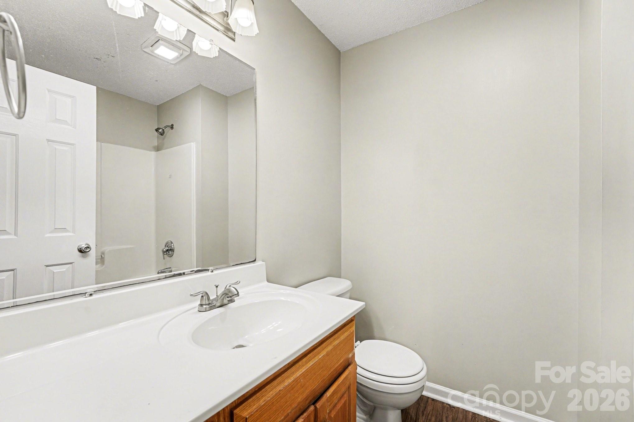 134 Clearview Road Statesville, NC 28625 - Photo 9 of 16 a bathroom with a sink a toilet and a mirror