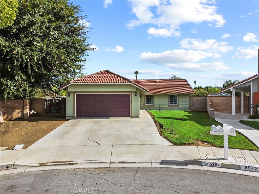 6552 Farmington Drive Riverside, CA 92504 - Photo 1 of 1 a front view of a house with yard