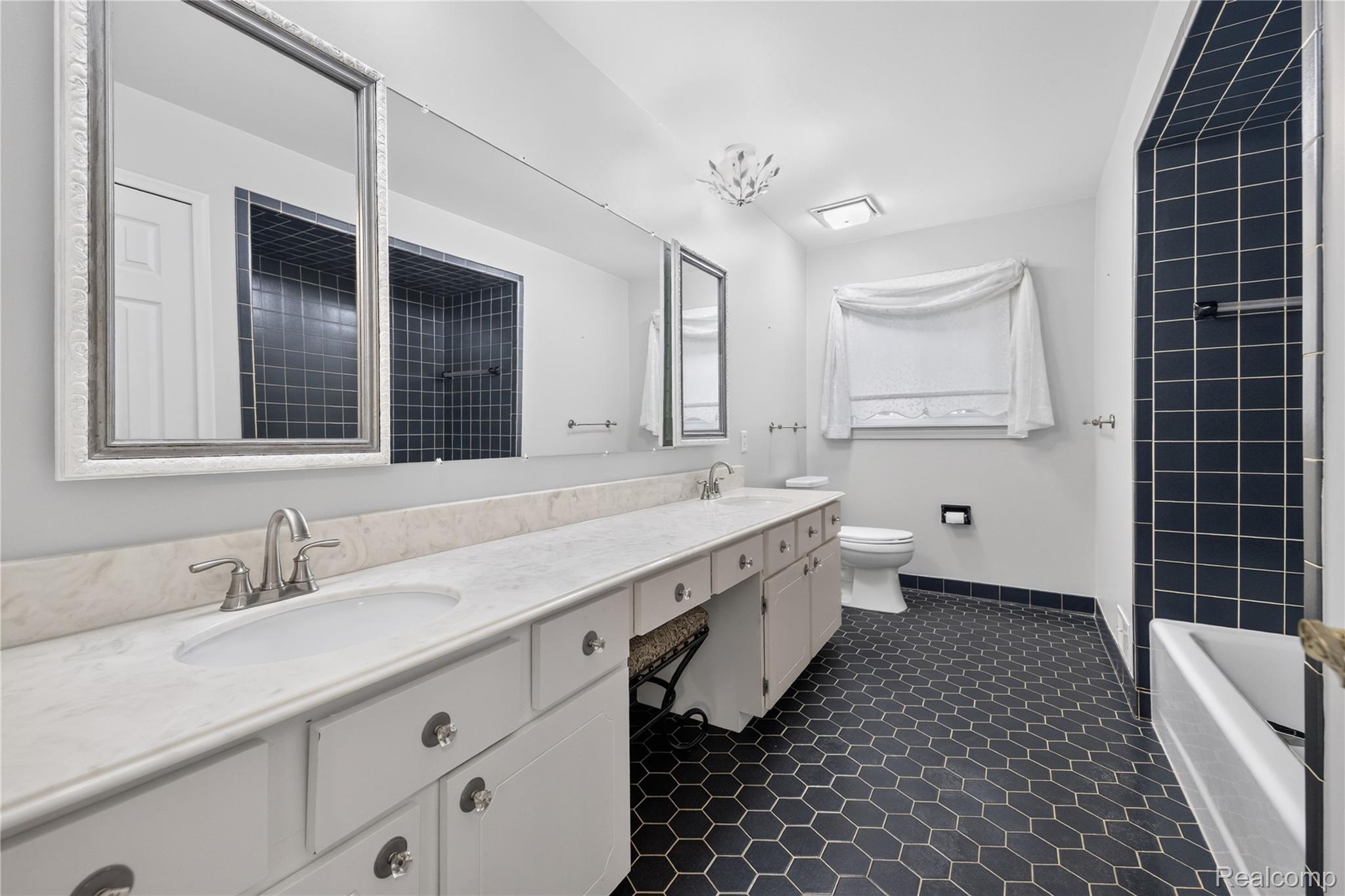 25645 Meridian Road Grosse Ile, MI 48138 - Photo 20 of 46 Dual vanity with integrated sinks and stone-finish countertop