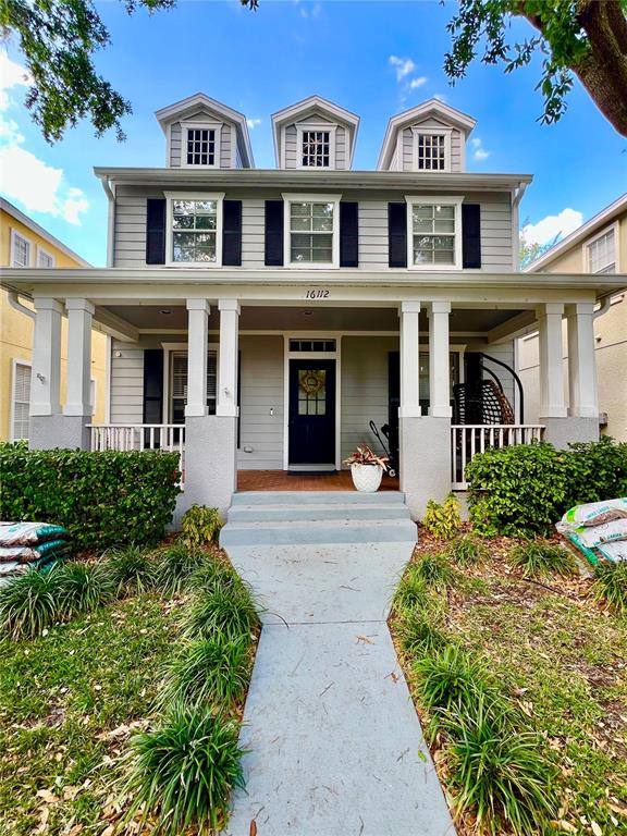 16112 Loneoak View Drive Lithia, FL 33547 - Photo 1 of 1 a front view of a brick house with a yard
