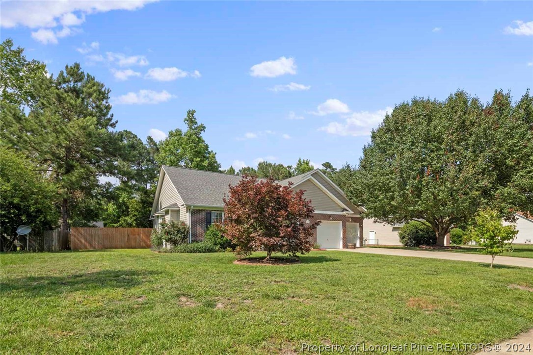 103 Kernstown Road Raeford, NC 28376 - Photo 2 of 48 a view of a house with a yard