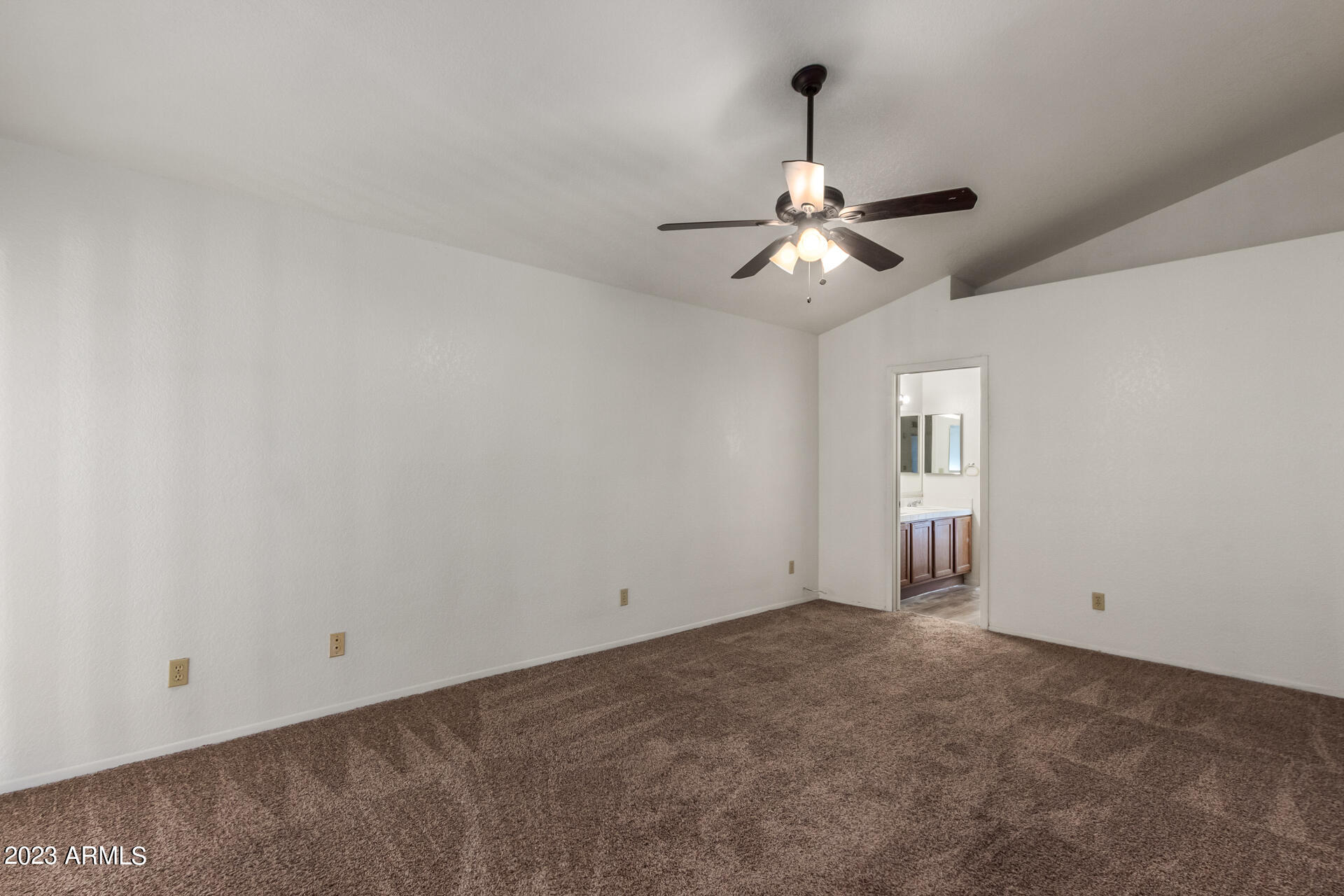 7331 West Paradise Drive Peoria, AZ 85345 - Photo 14 of 27 a view of a chandelier fan