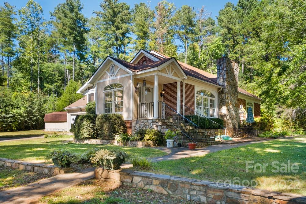 581 Flynn Road Rutherfordton, NC 28139 - Photo 1 of 37 a front view of a house with a yard