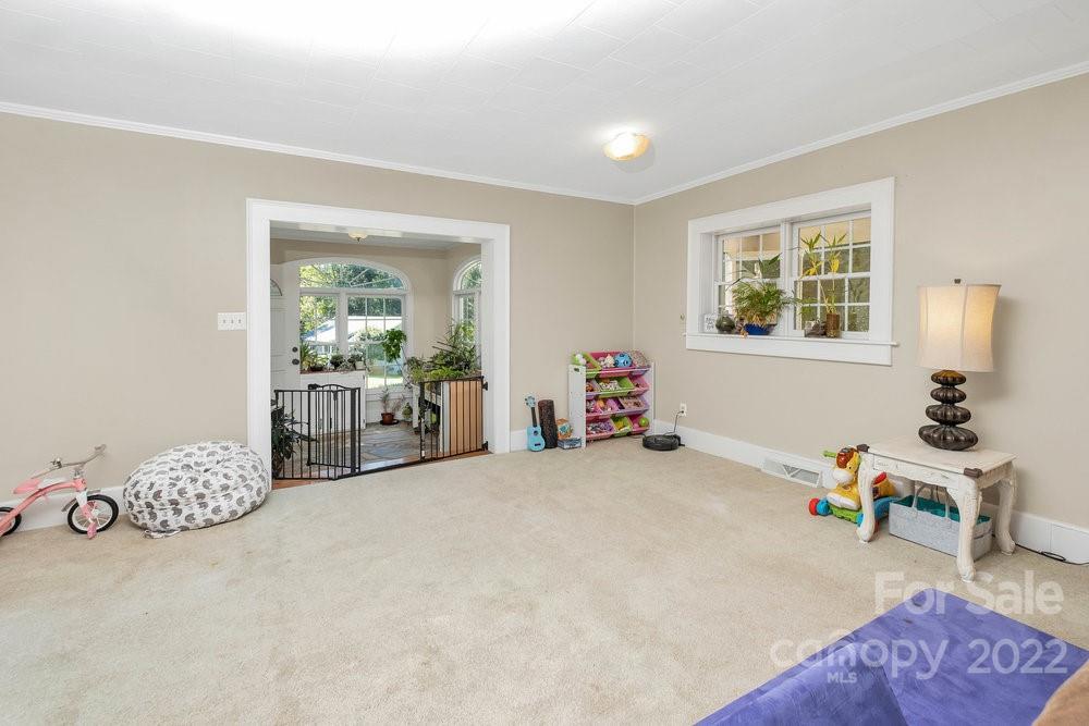 581 Flynn Road Rutherfordton, NC 28139 - Photo 17 of 37 a bedroom with furniture and a window