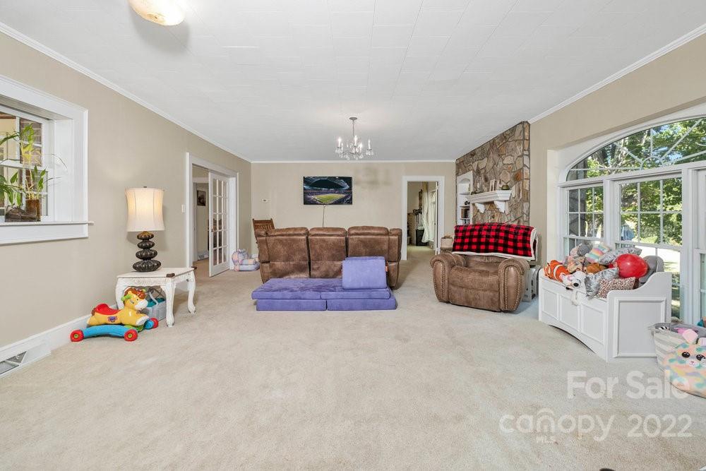 581 Flynn Road Rutherfordton, NC 28139 - Photo 19 of 37 a bed room with furniture and a window