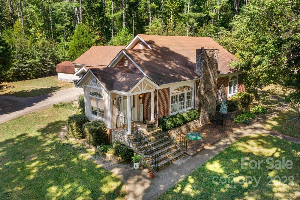 581 Flynn Road Rutherfordton, NC 28139 - Photo 2 of 37 a view of a house with a yard
