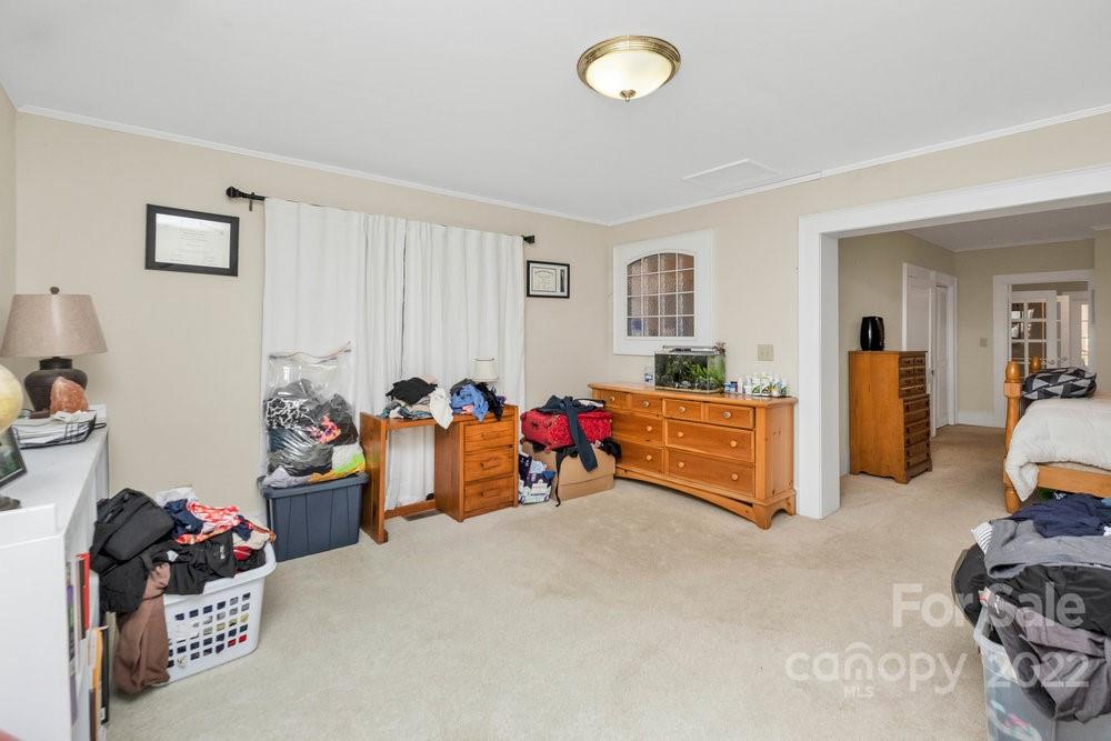581 Flynn Road Rutherfordton, NC 28139 - Photo 24 of 37 a living room with furniture and a wooden floor