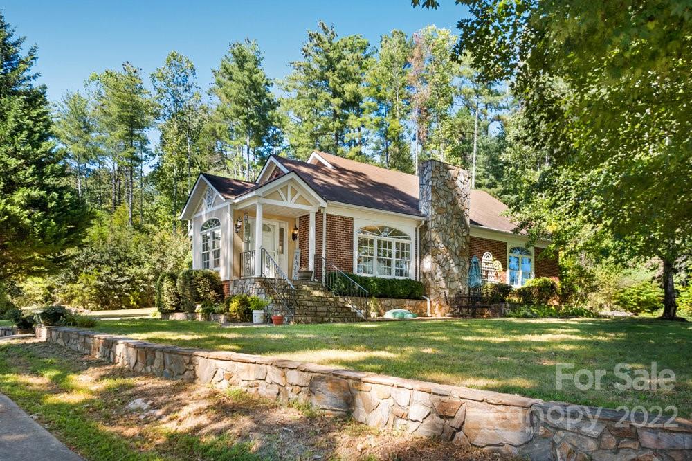 581 Flynn Road Rutherfordton, NC 28139 - Photo 3 of 37 a front view of a house with a yard