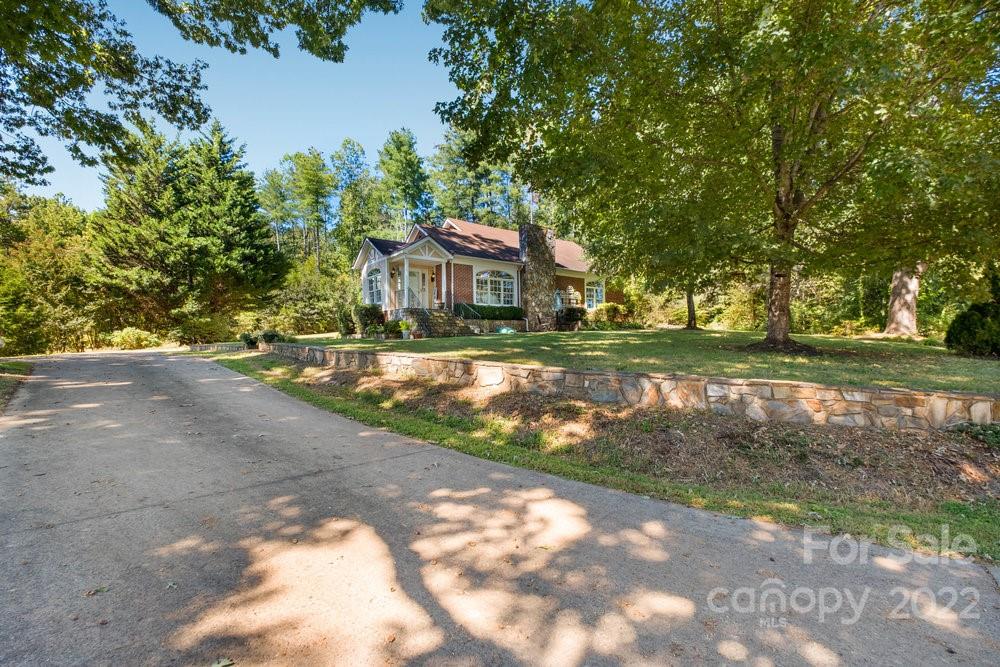 581 Flynn Road Rutherfordton, NC 28139 - Photo 5 of 37 a view of a house with a yard