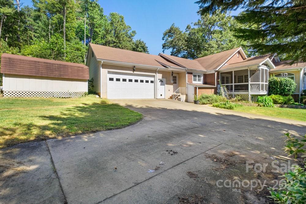 581 Flynn Road Rutherfordton, NC 28139 - Photo 9 of 37 a front view of a house with a yard
