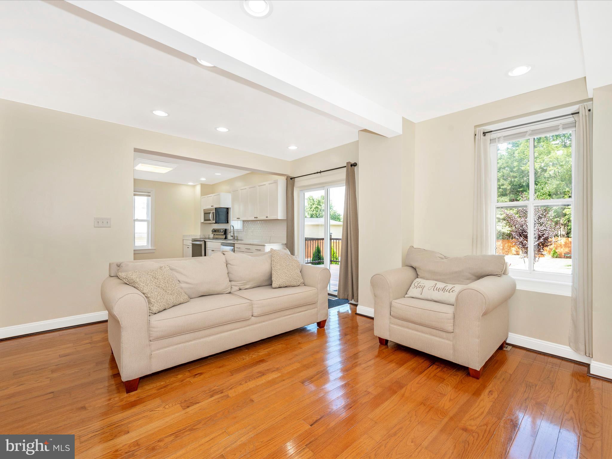 5924 Broad Run Road Jefferson, MD 21755 - Photo 11 of 54 a living room with furniture and a large window