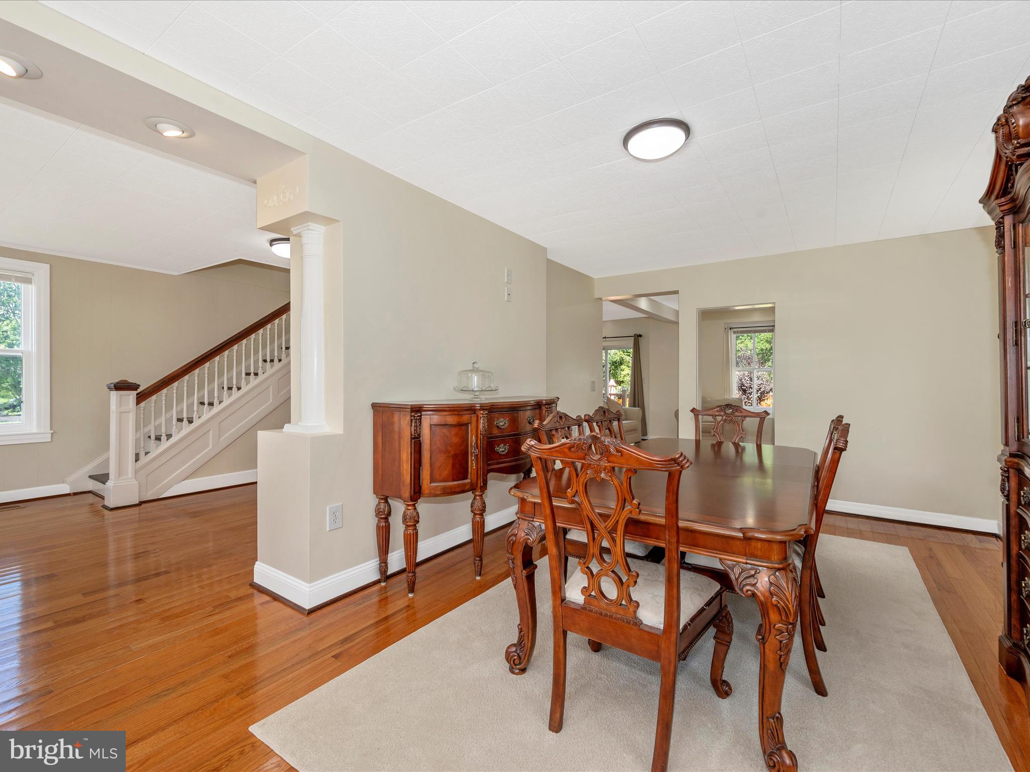 5924 Broad Run Road Jefferson, MD 21755 - Photo 14 of 54 a view of a dining room with furniture and wooden floor