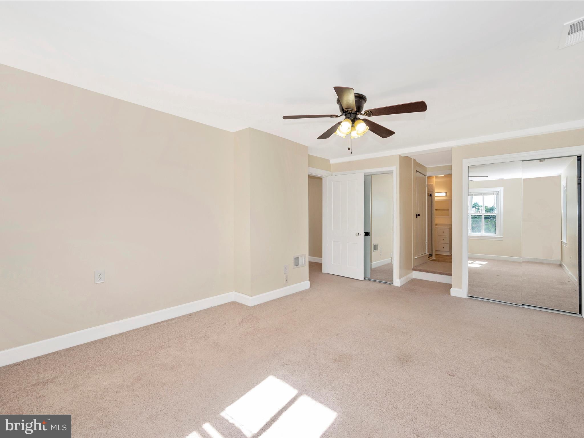 5924 Broad Run Road Jefferson, MD 21755 - Photo 27 of 54 a view of a livingroom with a ceiling fan and carpet