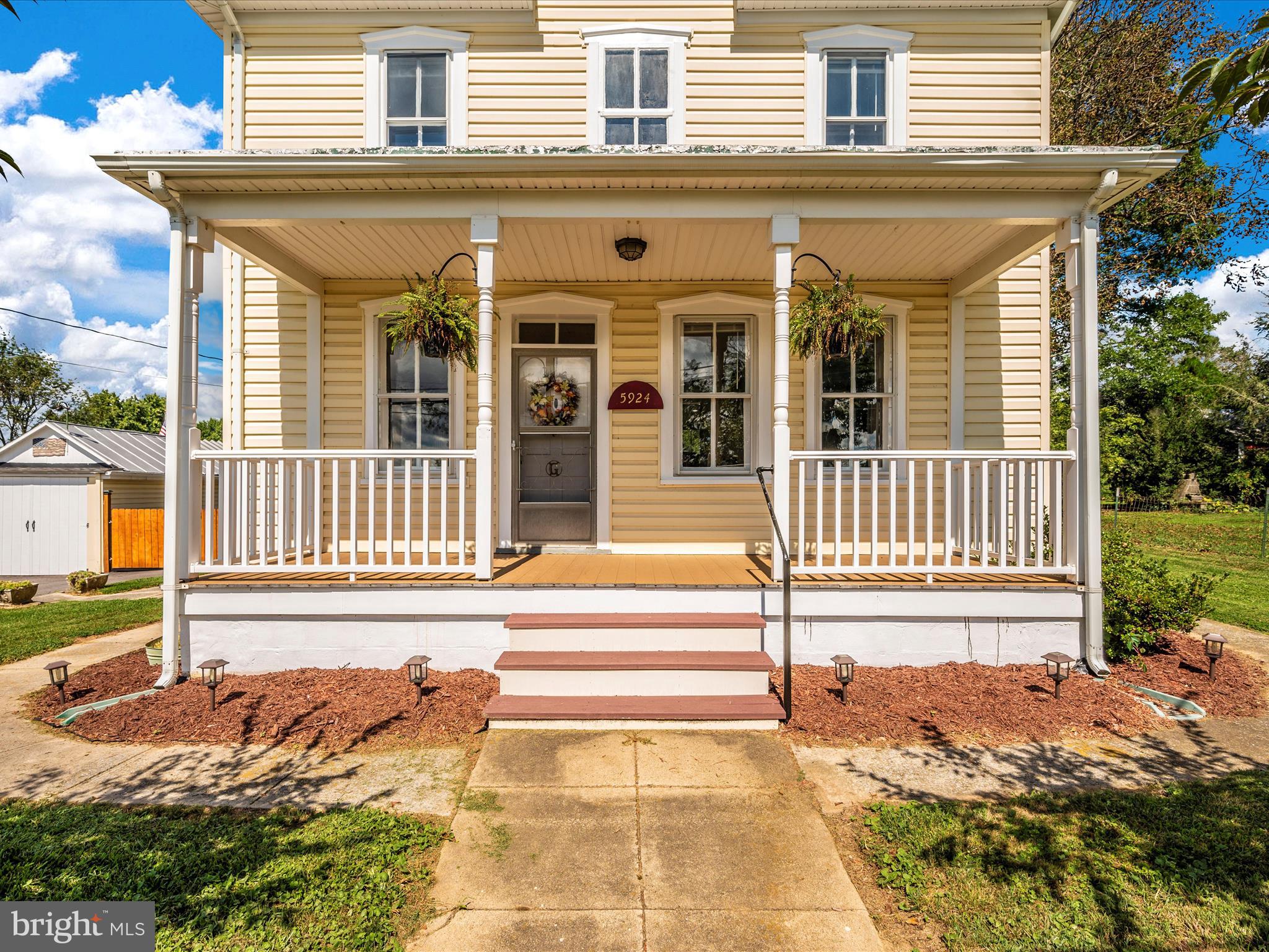 5924 Broad Run Road Jefferson, MD 21755 - Photo 3 of 54 a front view of a house with a yard