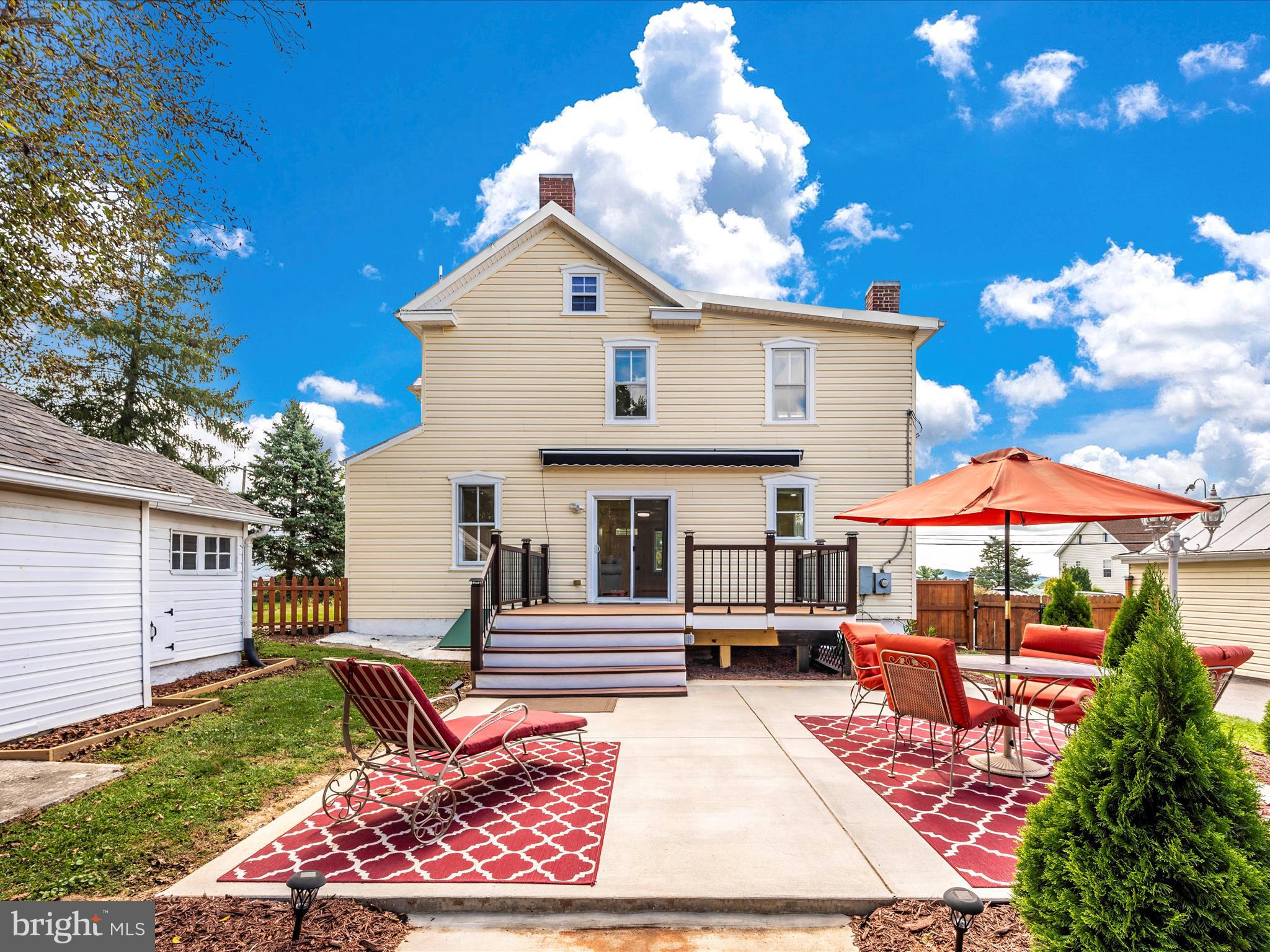 5924 Broad Run Road Jefferson, MD 21755 - Photo 4 of 54 a view of a house with backyard sitting area and barbeque oven