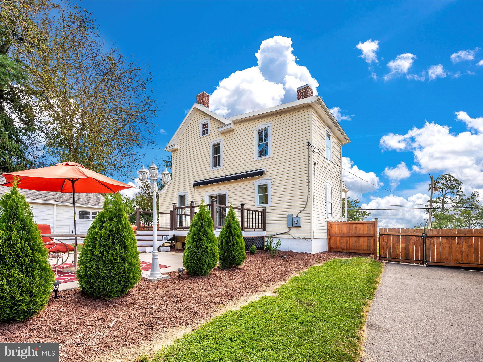 5924 Broad Run Road Jefferson, MD 21755 - Photo 5 of 54 a view of a house with backyard and sitting area