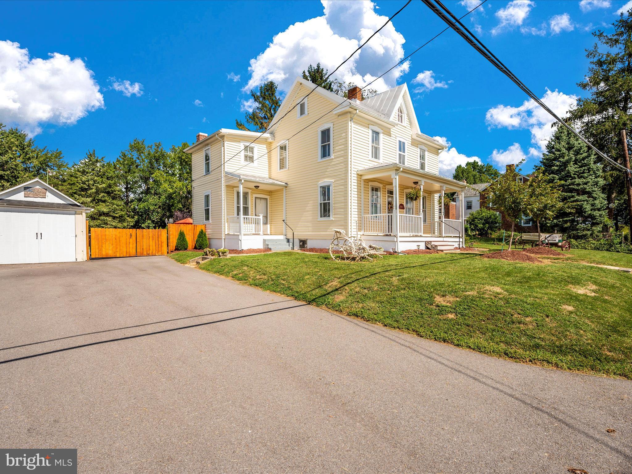 5924 Broad Run Road Jefferson, MD 21755 - Photo 51 of 54 a front view of a house with a yard