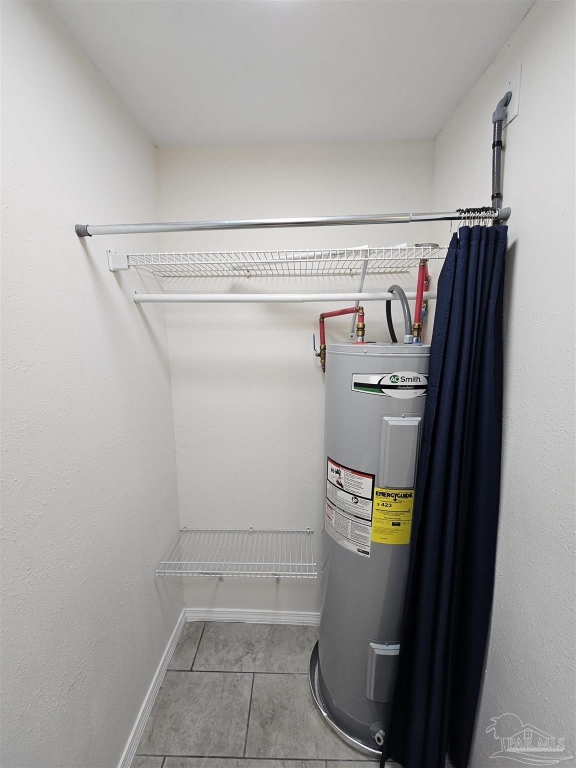 9775 North Loop Road, Unit 1 Pensacola, FL 32507 - Photo 8 of 12 a utility room with dryer and washer