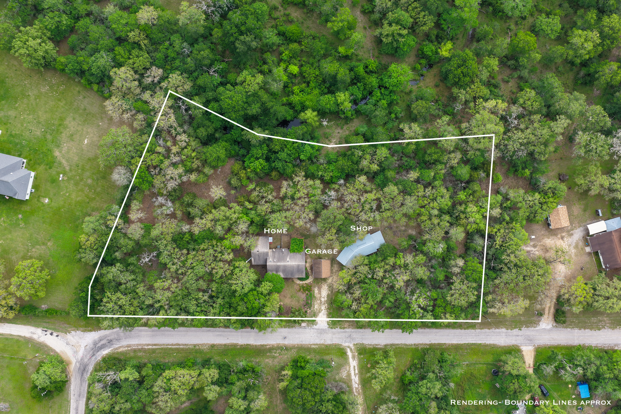 877 Hollow Bend Road, Unit 229 Caldwell, TX 77836 - Photo 2 of 18 a view of a yard