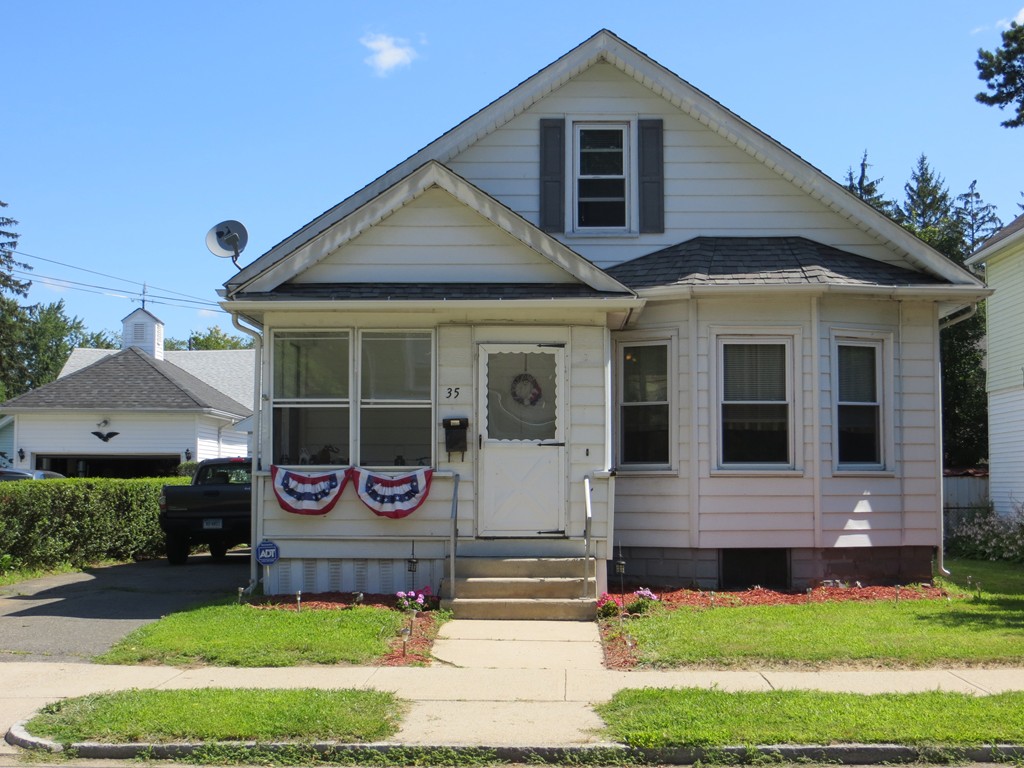 a front view of house with yard