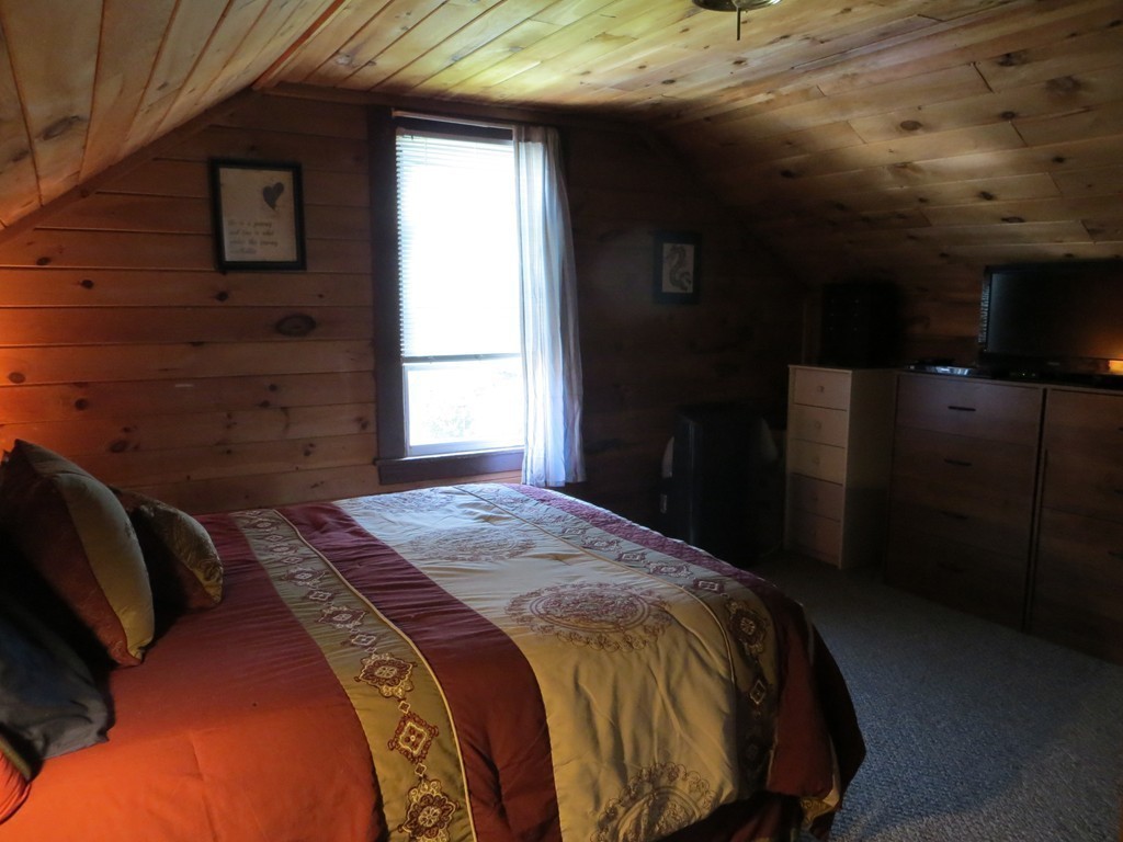 35 Ardmore Street Springfield, MA 01104 - Photo 12 of 19 a bedroom with a bed and a window