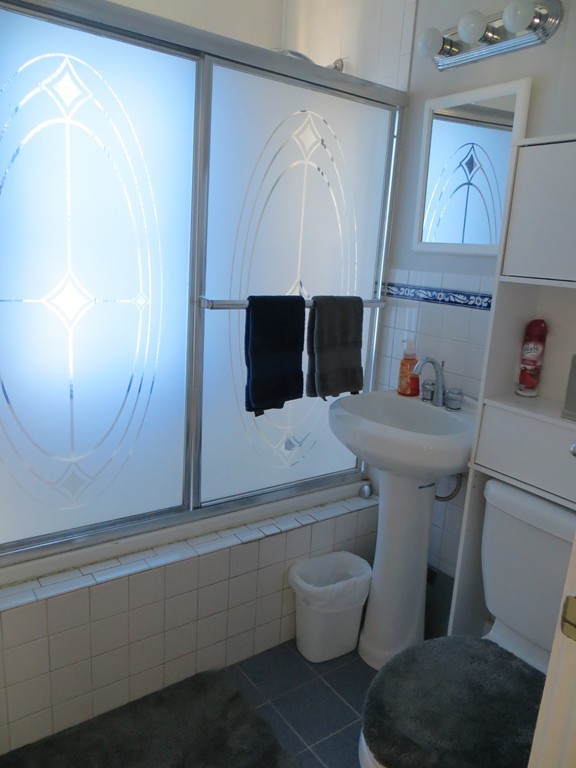 35 Ardmore Street Springfield, MA 01104 - Photo 15 of 19 a bathroom with a sink toilet and shower