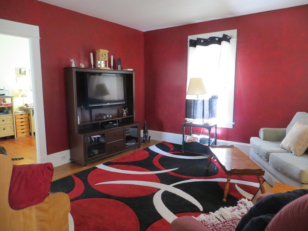 35 Ardmore Street Springfield, MA 01104 - Photo 4 of 19 a living room with furniture and a flat screen tv