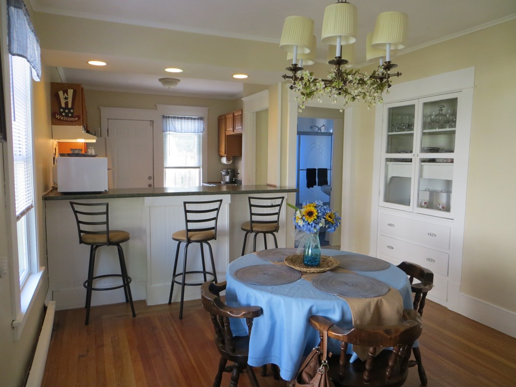 35 Ardmore Street Springfield, MA 01104 - Photo 5 of 19 a view of a dining room with furniture and wooden floor