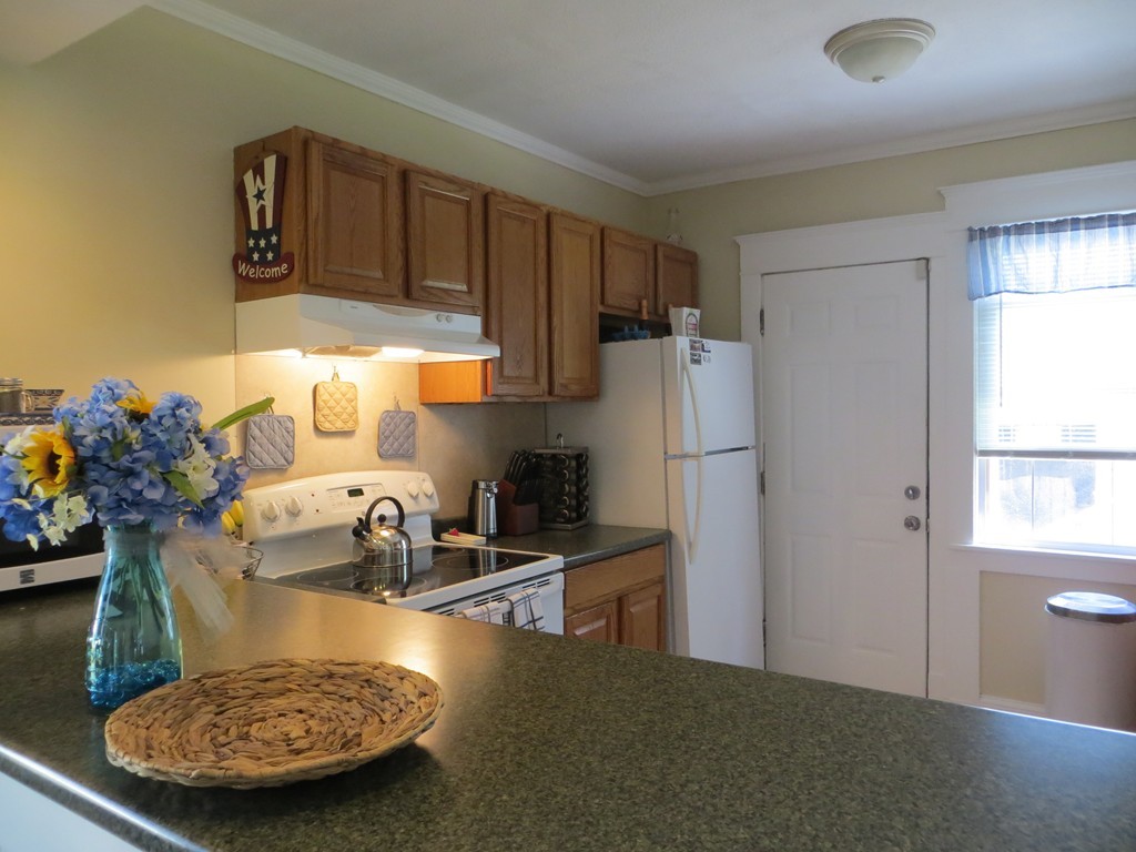35 Ardmore Street Springfield, MA 01104 - Photo 10 of 19 a kitchen with refrigerator and window