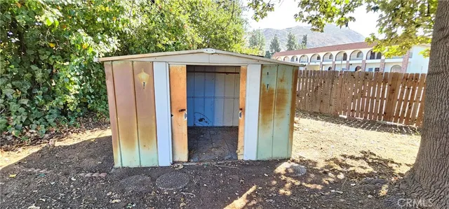 a view of a back yard of the house