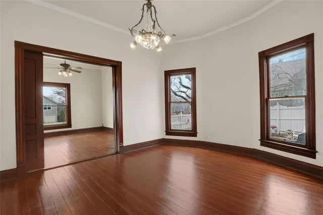 a view of livingroom with window and hardwood floor