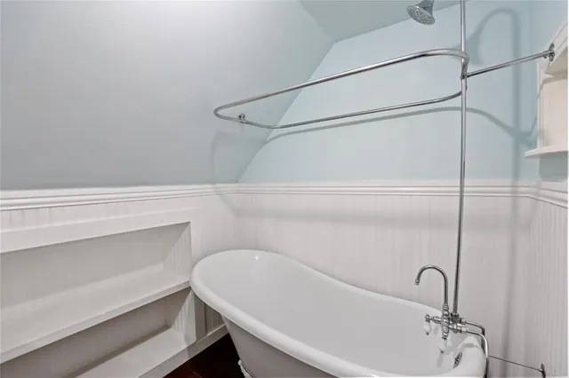 a bathroom with a sink and toilet