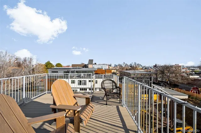 a view of a balcony with chairs