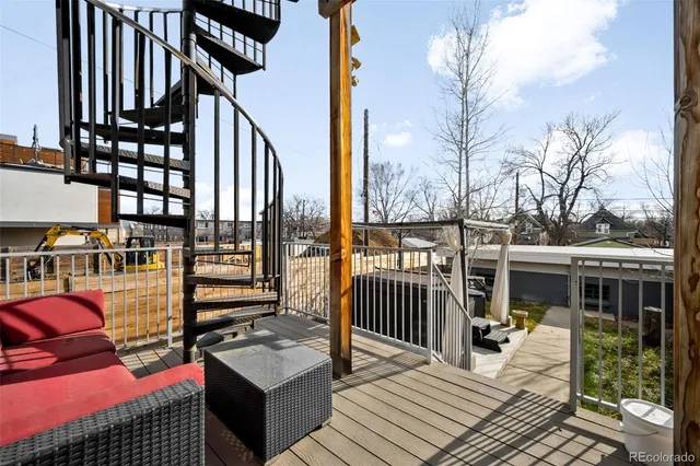 a view of a balcony with chairs