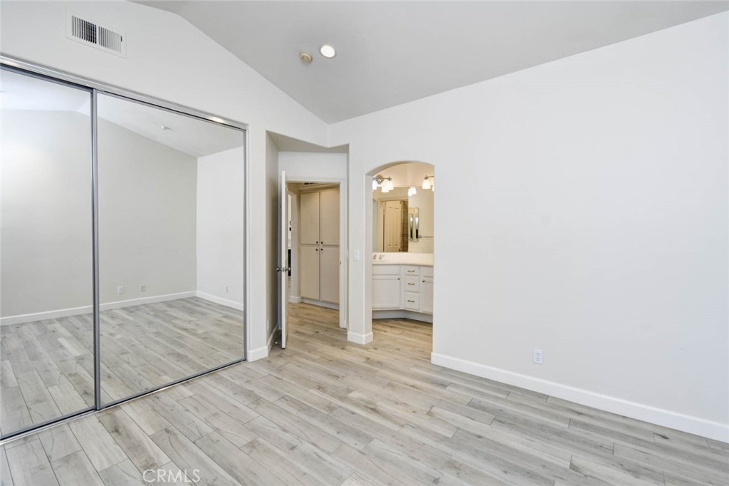 1 La Ronda Irvine, CA 92606 - Photo 15 of 29 a view of empty room with wooden floor and cabinet