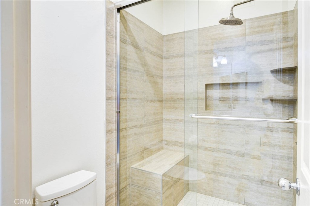 1 La Ronda Irvine, CA 92606 - Photo 17 of 29 a bathroom with a toilet and a shower
