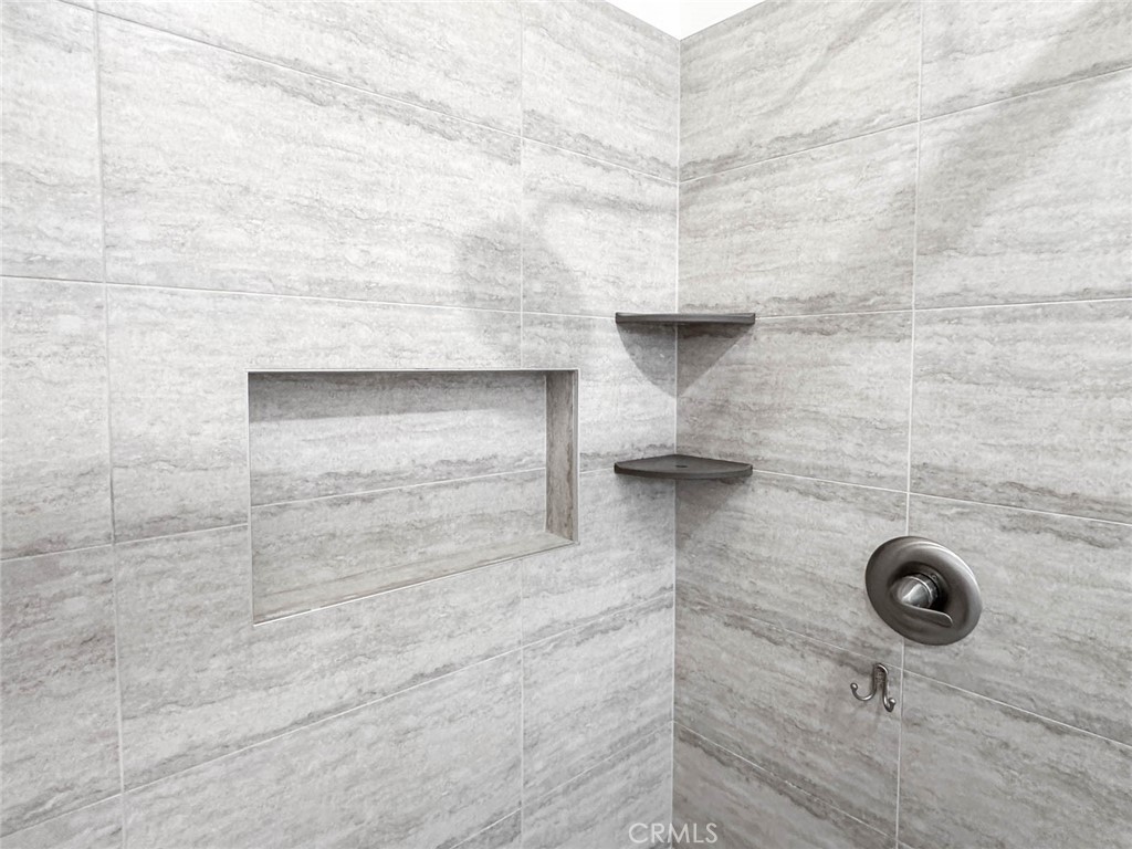1 La Ronda Irvine, CA 92606 - Photo 18 of 29 a bathroom with a shower