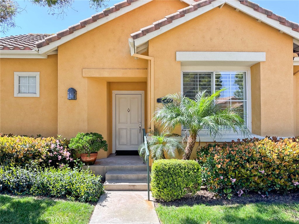 1 La Ronda Irvine, CA 92606 - Photo 2 of 29 a front view of a house with a yard