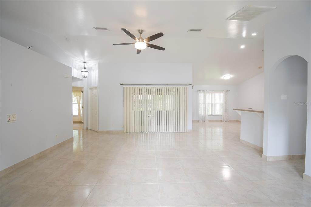 4913 Cromey Road North Port, FL 34288 - Photo 4 of 36 a view of an empty room with a window